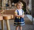 Navy and yellow strapless blouse and skirt set