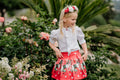 Red floral skirt with male pleats