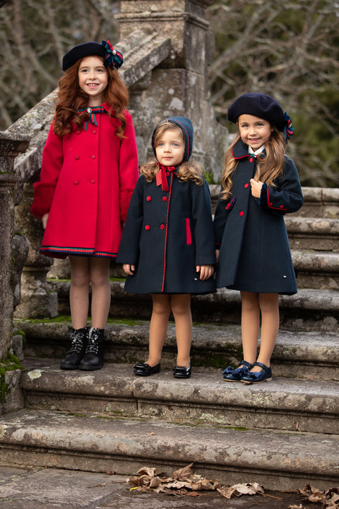 Red farm coat with navy buttons