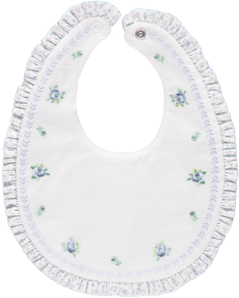 White and blue bib with floral embroidery and frill