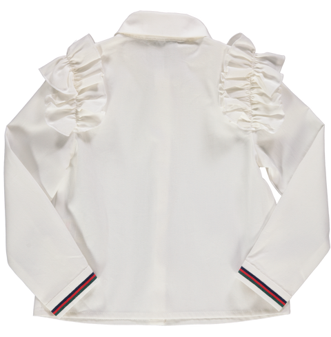 Blusa branca com laço e alfinete em pérola