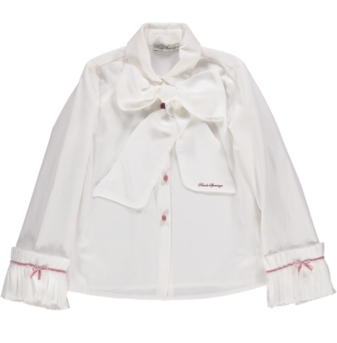 White blouse with pink velvet bow and ribbon