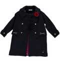 Navy coat with red rose appliqué
