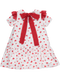Dress with red hearts, detail on the sleeve and bow on the back