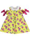 Yellow dress with floral pattern, collar and bows