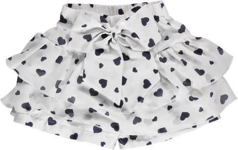 White shorts with navy blue hearts with ruffles and bow