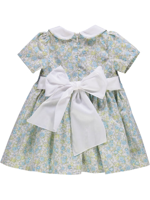 Vestido rosa florido com smocks, gola peter-pan e laço nas costas