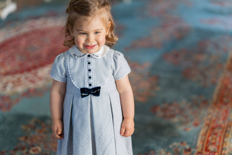 Blue dress with velvet bow and embroidered collar