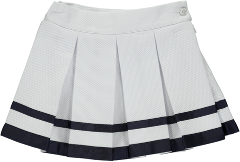 White male skirt with pattern and navy blue ribbon