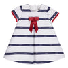 White and navy dress with inverted pleat and bow