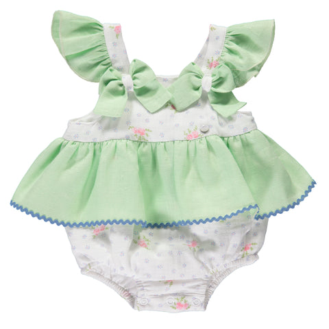White baby girl bodysuit with floral pattern and green ruffles