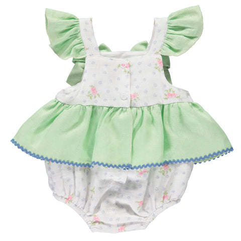 White baby girl bodysuit with floral pattern and green ruffles