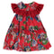 Red dress with colorful floral pattern and ruffles