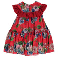 Red dress with colorful floral pattern and ruffles