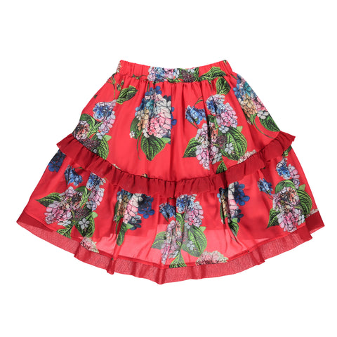 Red high and low skirt with floral pattern and ruffles