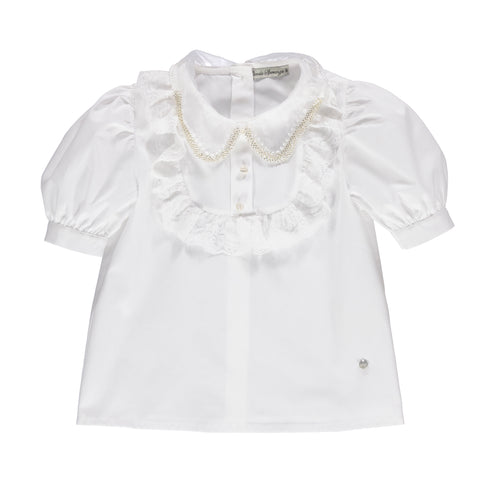 White blouse with lace and beige buttons