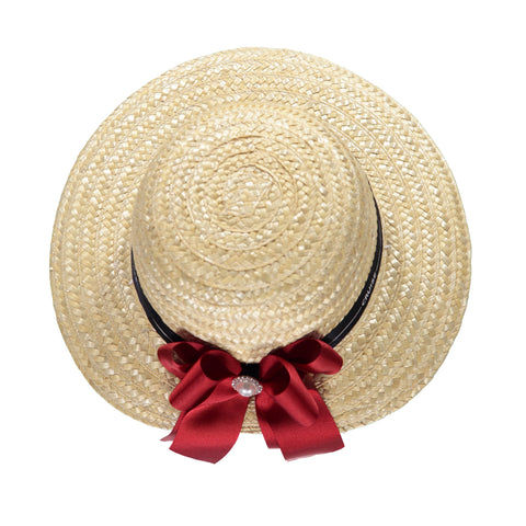Straw hat with navy ribbon and red bow