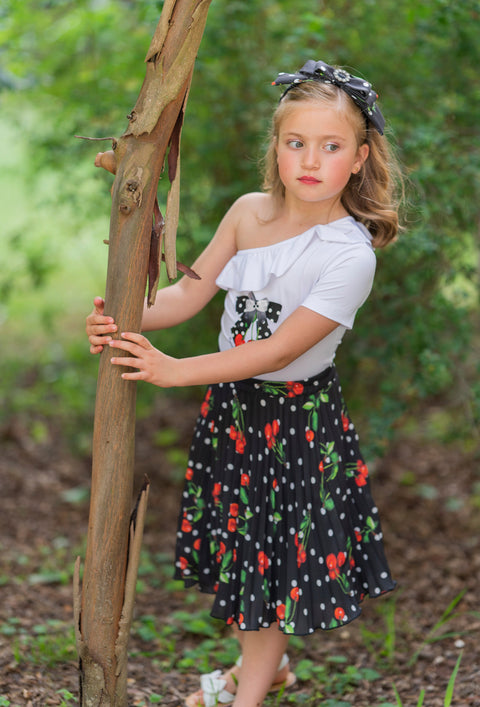 Black pleated skirt with cherries and polka dots pattern