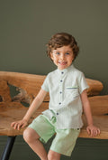 Set for boys with green shirt and navy shorts