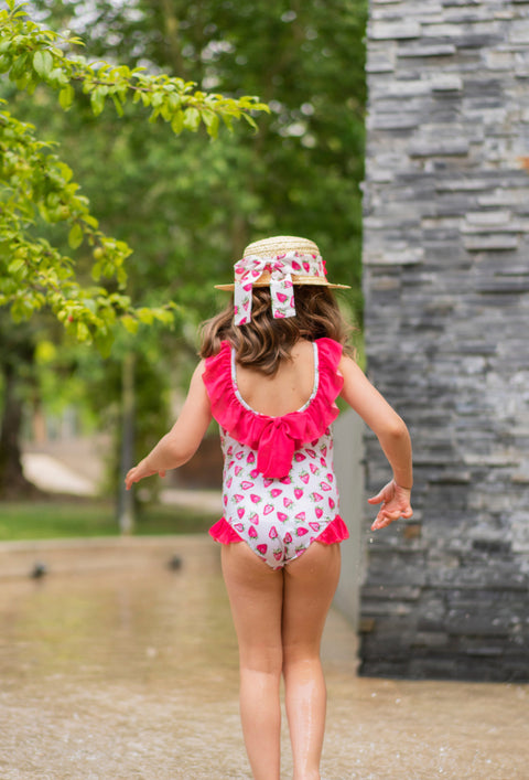 Pink swimsuit with strawberry pattern